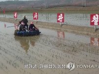 북, 올해 첫 모내기…
